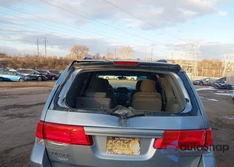 2010 Honda Odyssey Ex z USA, uszkodzony, nr VIN 5FNRL3H47AB097384